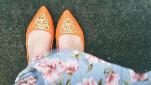 Orange Women shoes on the pavement