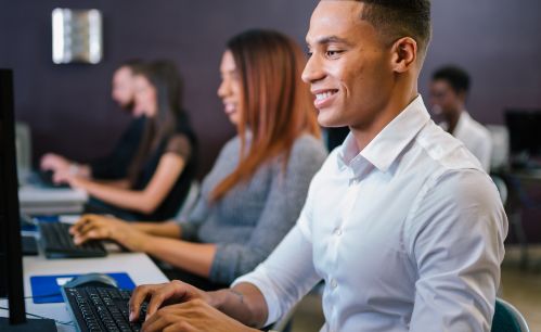 Group of people on computers