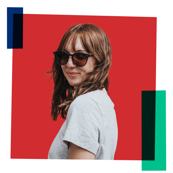 Headshot of a women with a red background