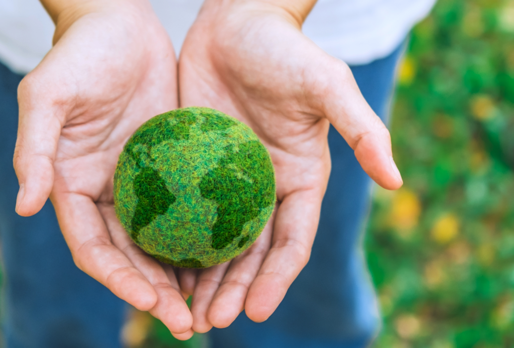 Someone holding a green ball in their hands
